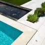 Large Contemporary Rural Garden | Infinity Edge Lap Pool, Ornamental Pool, and Limestone Paving - Copyright martingardner.com | Interior Designers